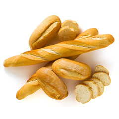 fresh white bread baguette and bun isolated on a white background with seeds