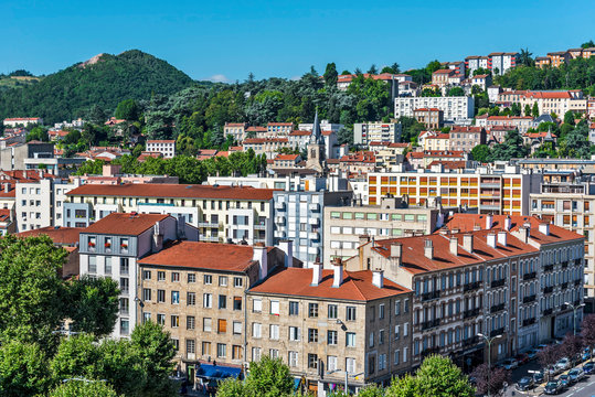 Saint Etienne Cityscape As Seen From The Tower Of Cite Du Design In Western Direction. The Montaud Hill Is At Background.