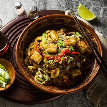 Asian Vegan Stir Fry With Tofu, Rice Noodles And Vegetables, Top View.