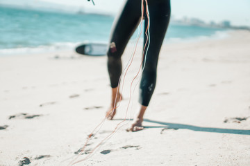 Kitesurfer is ready to surf the blue sea.