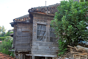 Ruined house on the seashore, construction waste.