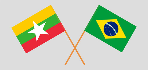 Crossed flags of Myanmar and Brazil