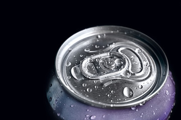 aluminum soda and beer beverage can with water droplets isolated on dark background, metal can, recyclable product