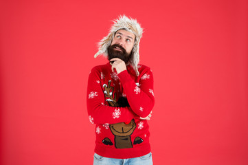 Make christmas wish. Life changing decision. Hipster bearded man wear winter sweater and hat. Happy...