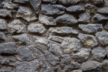 Wall made of natural rocks 