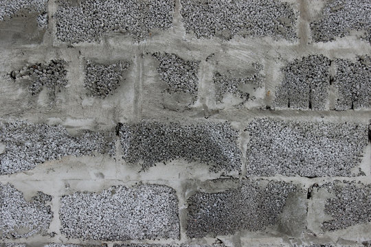 Wall made of claydite-concrete blocks with cement between blocks