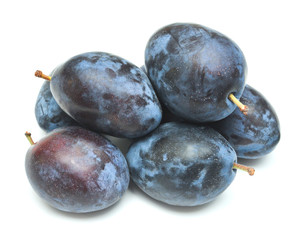 Plums isolated on white background. A useful fruit for health, vitamins. Flat lay, top view