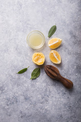 Lemon fresh and lemons. Citrus juice extractor. The concept of weight loss . Citrus juicer and squeezed fruits