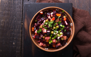 Assortment vegetable salad of Russian cuisine - vinaigrette - beet salad. top view