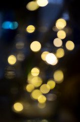 Obraz premium burning colored lights garlands on the background, blurred, out of focus, bokeh
