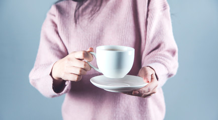 woman hand cup of tea or coffee