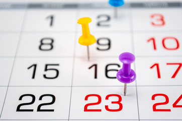 pins on calendar on  date of month, end of month, reports, end of work, deadline,  twenty-third day...