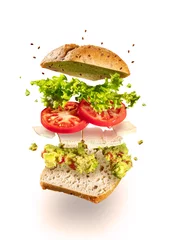 Poster Exploded vegetarian sandwich with guacamole and tofu on white © georgemuresan