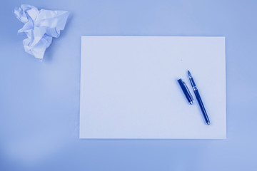 White clean paper and pen for work and study. Business concept. Place for text.