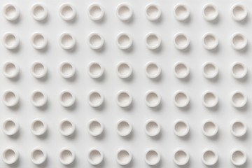 Plastic building block pattern of white color. Abstract background for copy space, top view