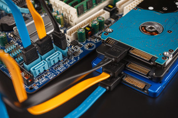connecting hard drives and SSD drives in a computer using the SATA interface, choosing SATA2 or...