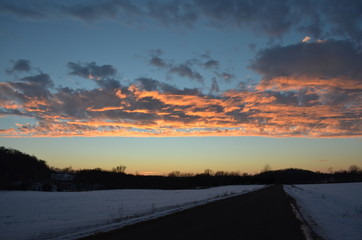 Winter Sunset Over Rural Road