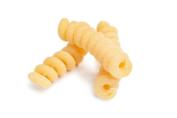 pasta from durum wheat curls fusilli, cavatappi, unprepared, raw pasta cellentani handmade isolated on white background close up macro
