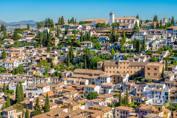 Fototapeta na wymiar The picturesque Albaicin district in Granada as seen from the Alhambra Palace. Andalusia, Spain.