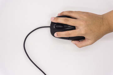 Black wire mouse in kid hand control on isolated white background