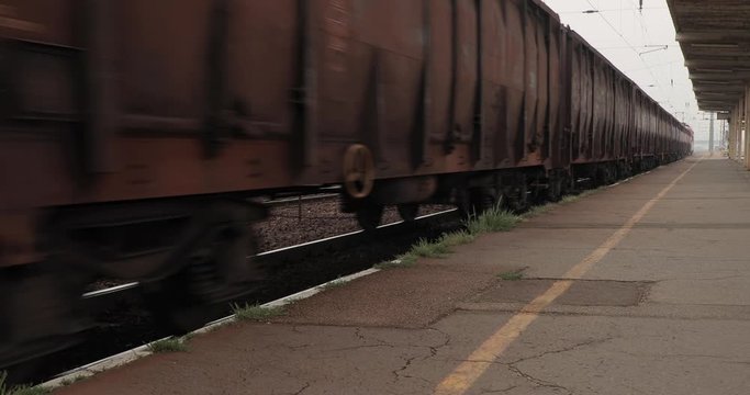 Freight train passing by on the rails