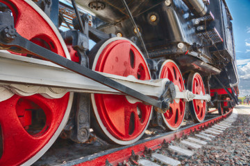 wheels of an ancient locomotive close-up, retro vehicle
