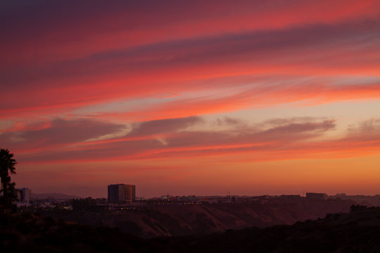 Sunset View Of San Diego, California And Red Cloudy Sky