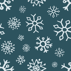 Seamless background of hand drawn snowflakes