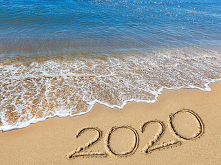 sea, sky, clouds, sand, footprints, inscription 2020,