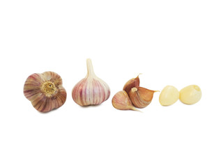 Garlic bulbes, unpeeled and peeled cloves. Isolated set on a white background.