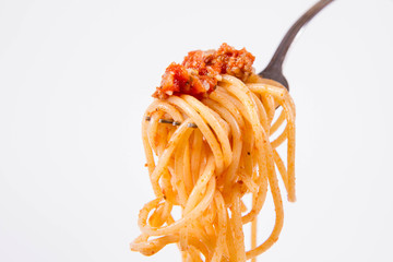 Spaghetti bolognese on a fork	