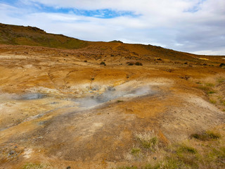 Fototapeta na wymiar Geothermal area, hot springs, mud volcanoes, Gunnuhver Iceland