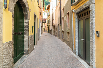 Narrow street of ancient village Torno, overlooking Lake Como, Italy