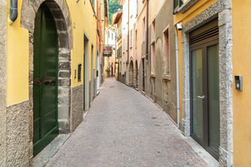 Obraz premium Narrow street of ancient village Torno, overlooking Lake Como, Italy