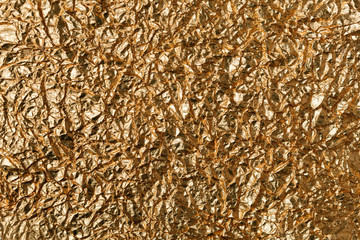 Crumpled Gold Foil. Background image and texture.