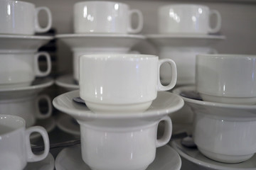 Fototapeta na wymiar white ceramic cups for tea or coffee