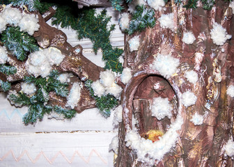 artificial tree with snow and large hollow