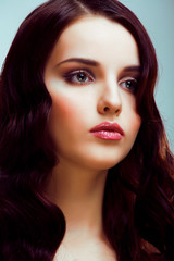young pretty brunette woman with hairstyle waves, luxury look fashion makeup close up