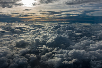 Fototapeta na wymiar Above clouds with the sun 