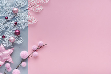 Romantic Christmas flat lay, top view on two color paper background with copy-space. Decorative...