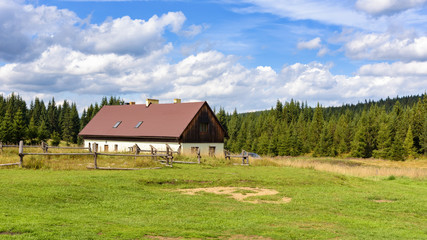 Fototapeta na wymiar House at the forest in Jizera Mountains