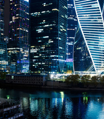 Skyscrapers in Moscow, city, financial center. Cityscape at night, lights