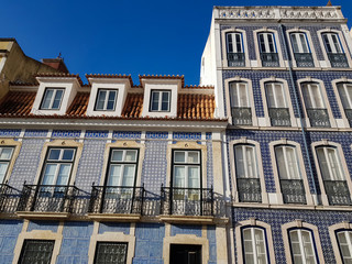 Portuguese houses facade with traditional portuguese tiles