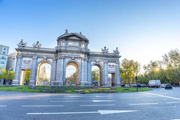 Fototapeta na wymiar The Alcala Door (Puerta de Alcala) is a one of the ancient doors of the city of Madrid, Spain. It was the entrance of people coming from France, Aragon, and Catalunia. It is a landmark of the city.