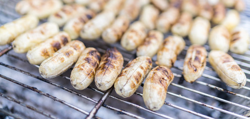 Pisang goreng or fried banana popular snack in Indonesian and Malay cuisines is made of banana or plantain, Asian cuisine concept image.