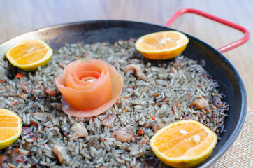 black paella, rice with squid - spanish cuisine