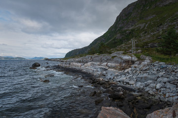 Fototapeta na wymiar Coast in Alnes, Godoy island, Norway. July 2019