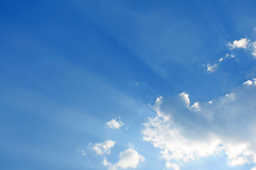 Blue sky and clouds with sun shine background.