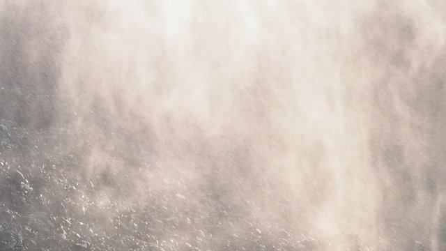 Coal heap close up. Pour drops of water onto a coal pile. Rain at the coal terminal.