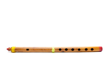 Bamboo wind instrument indian flute on white background